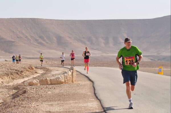 Runners hitting the marathon track.